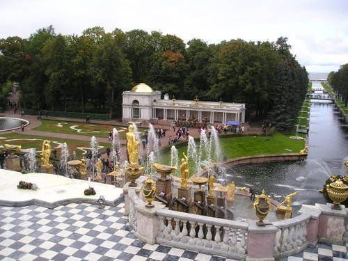 A fountain in a park with a checkered floor