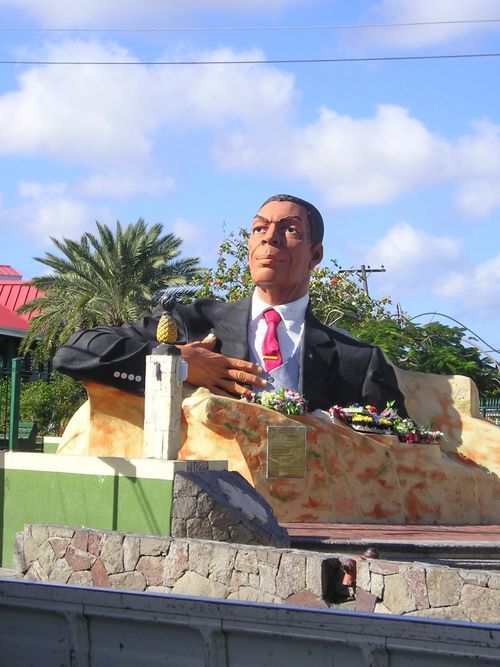 A statue of a man in a suit and tie