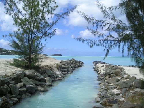 A river runs through a rocky area to the ocean
