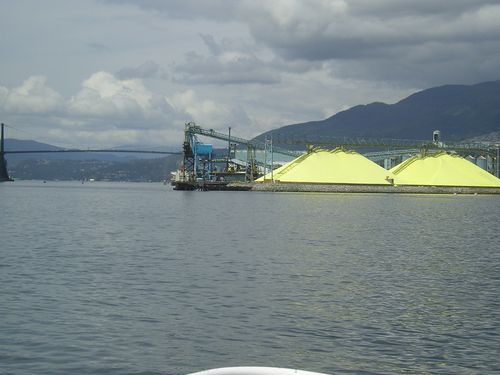 A large body of water with mountains in the background