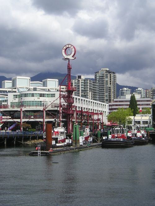 A red tower with a life preserver on top of it