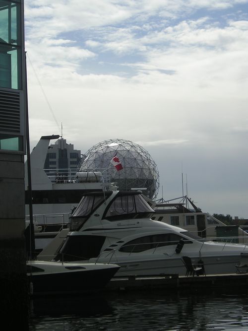 A boat with a canadian flag on top of it