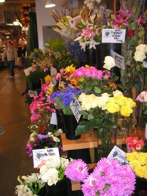 A bunch of flowers are on display in a store