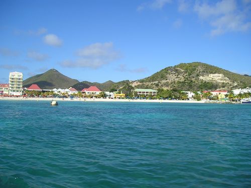 A large body of water with mountains in the background