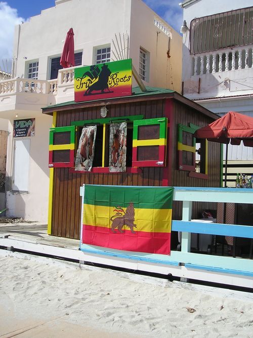 A building with a sign that says ' reggae ' on it