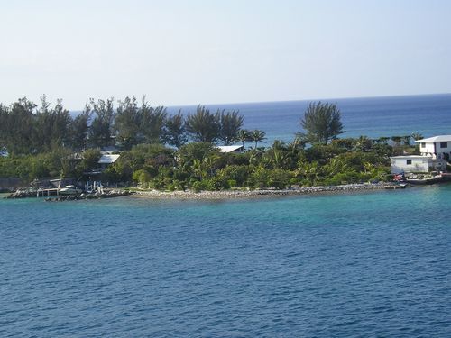 A small island in the middle of a body of water
