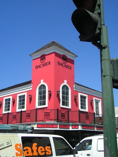 A red building with the word bacardi on it