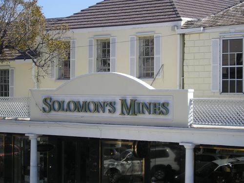 A building with a sign that says solomon 's mines
