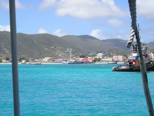 A large body of water with mountains in the background
