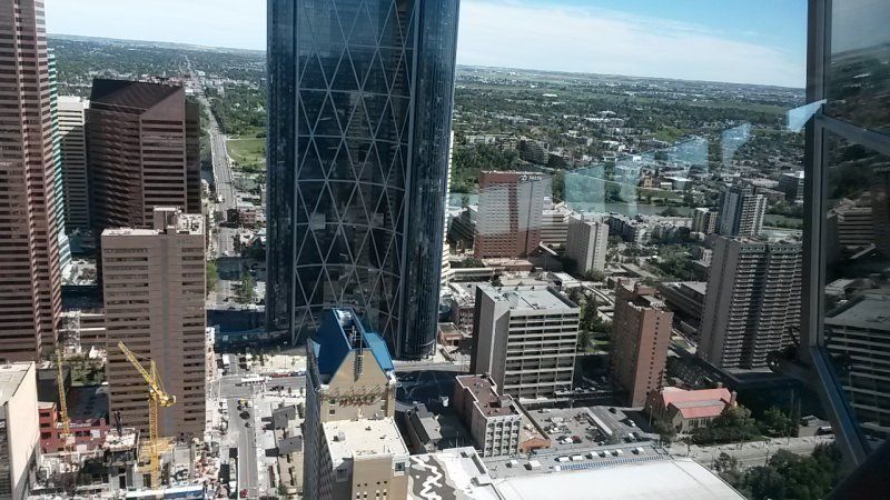 An aerial view of a city with lots of tall buildings