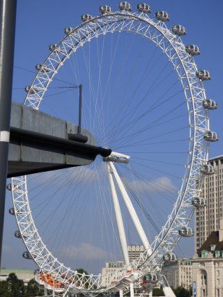 A ferris wheel with a blue sky in the background
