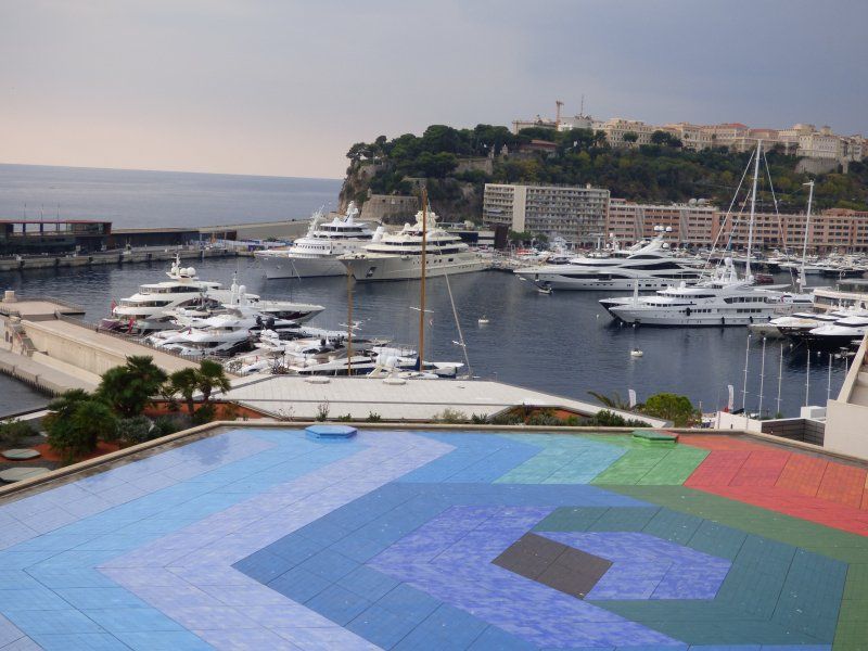 An aerial view of a harbor with boats in it