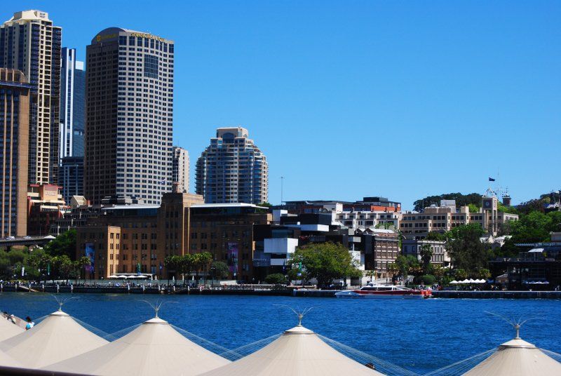 A large body of water with a city in the background