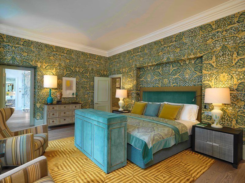 There is a large bed in the middle of the room.