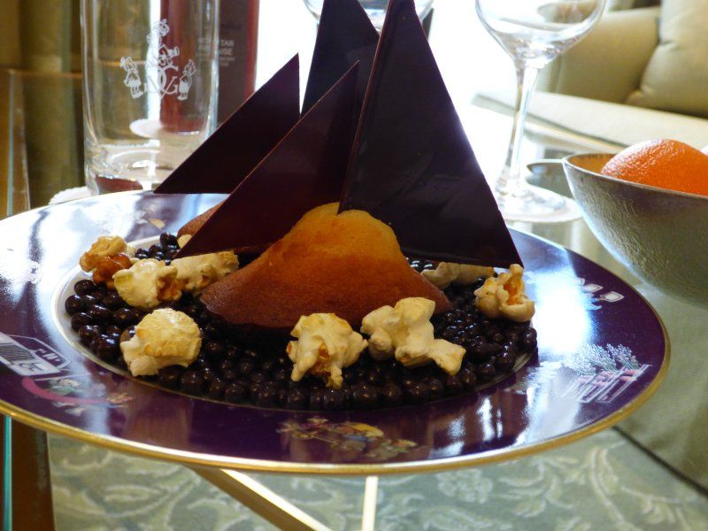 A purple plate with a dessert on it