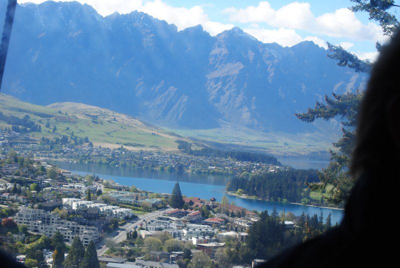A view of a lake with mountains in the background