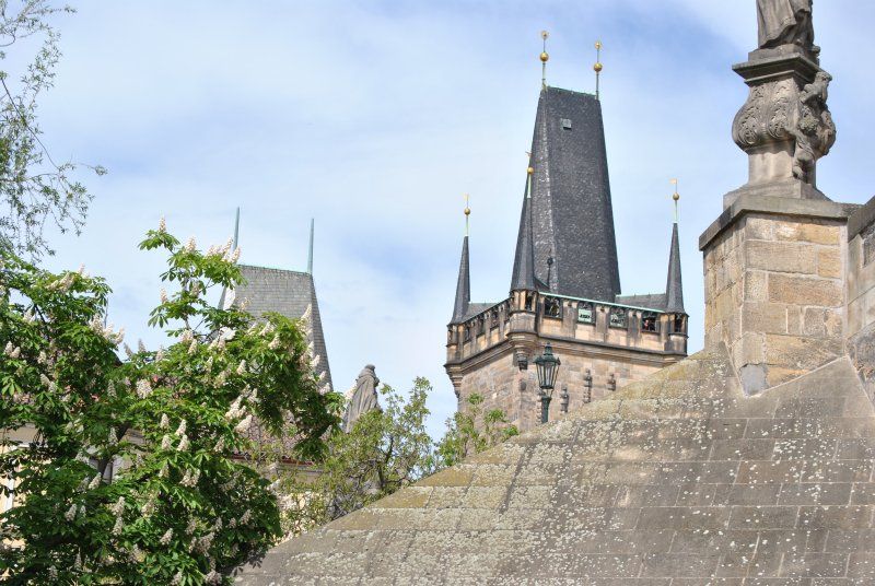A castle with a statue on top of it
