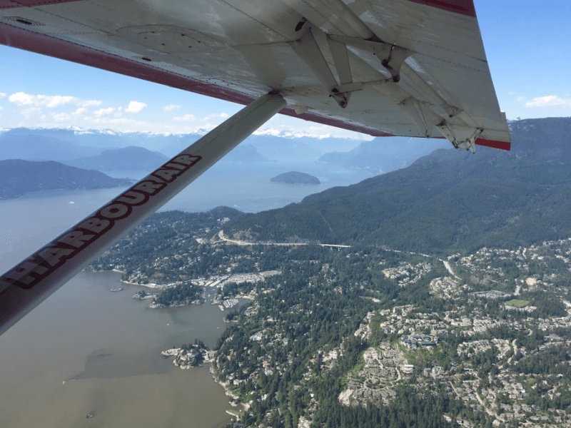 A plane with the word vancouver on the side of it