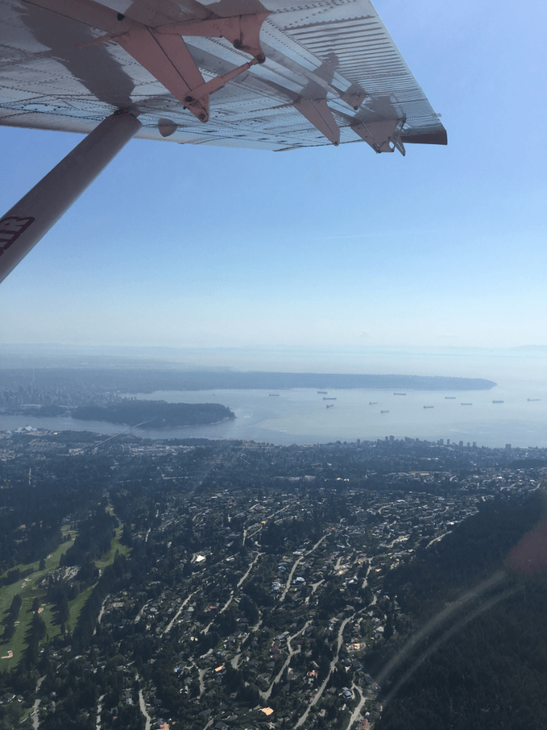 An aerial view of a city and a body of water