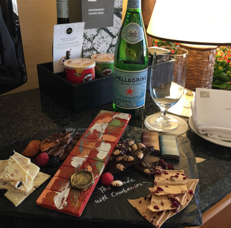 A bottle of pellegrino wine sits on a table