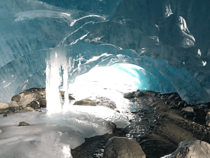 There is a waterfall in the middle of the ice cave.