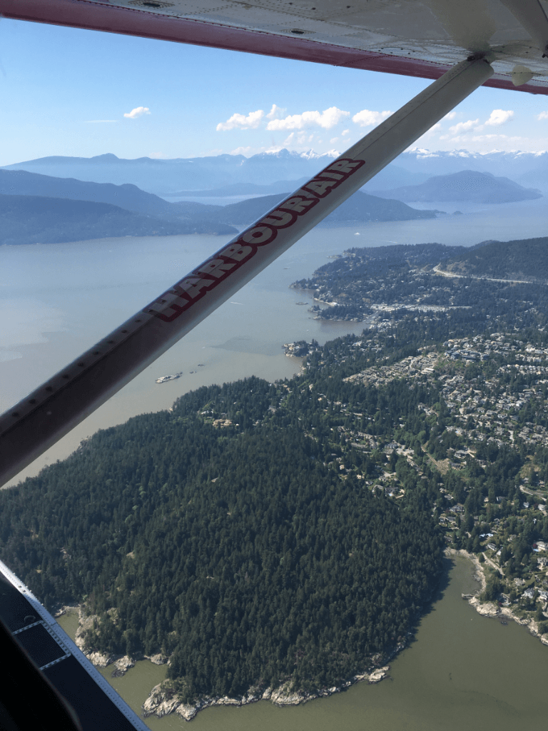 An aerial view of a body of water with the word vancouver on the side