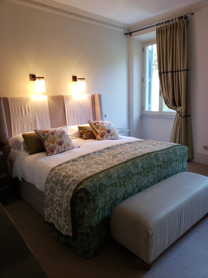 There is a large bed in the middle of the room.