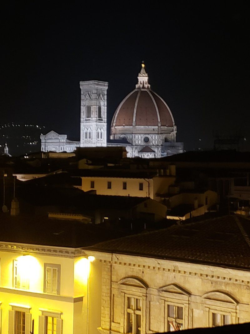 The dome of the cathedral is lit up at night