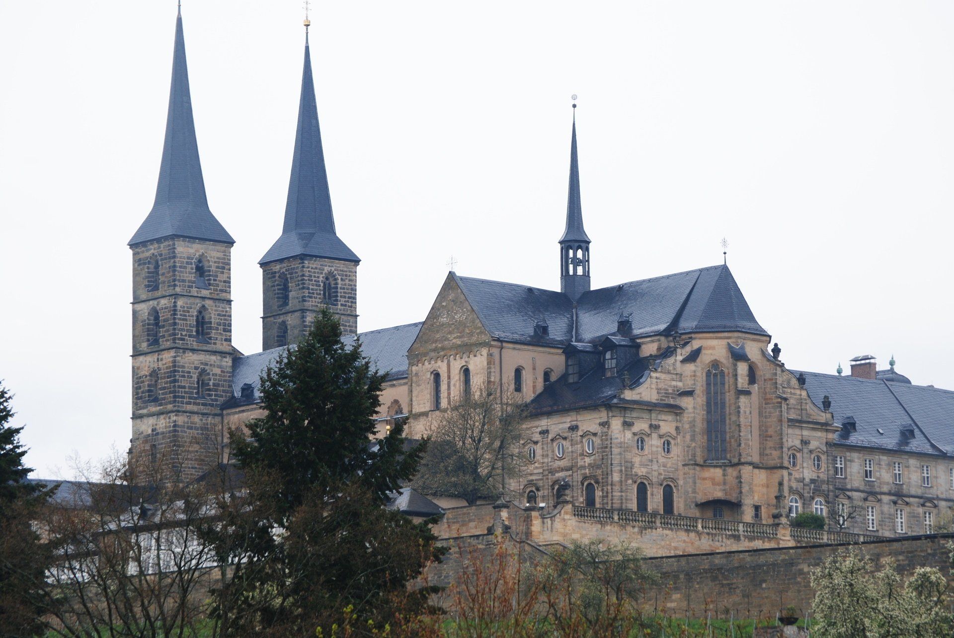 A large building with two steeples on top of it