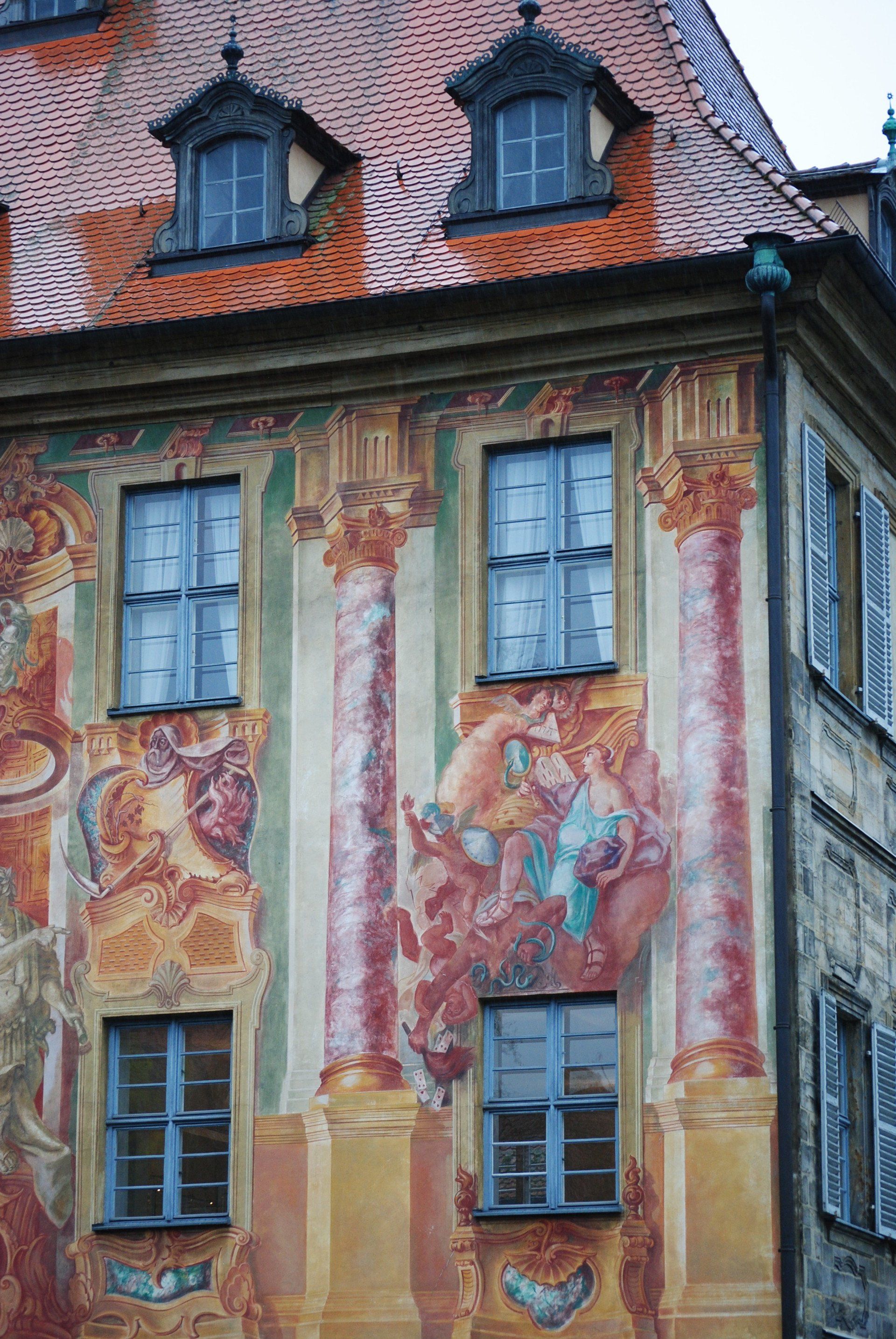 A building with a painting on the side of it