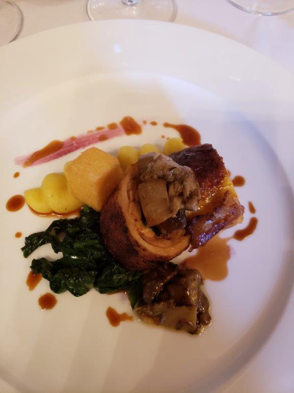 A close up of a plate of food on a table