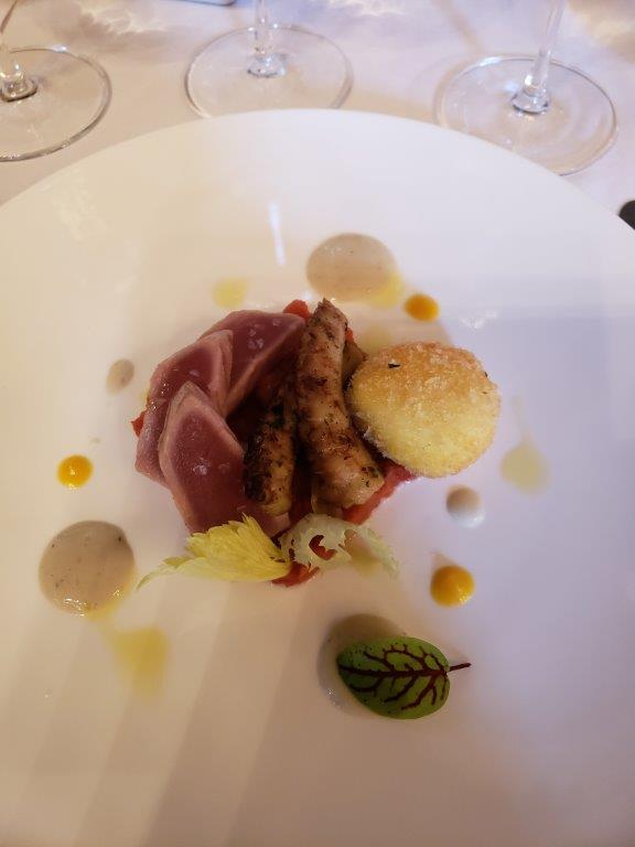 A close up of a plate of food on a table