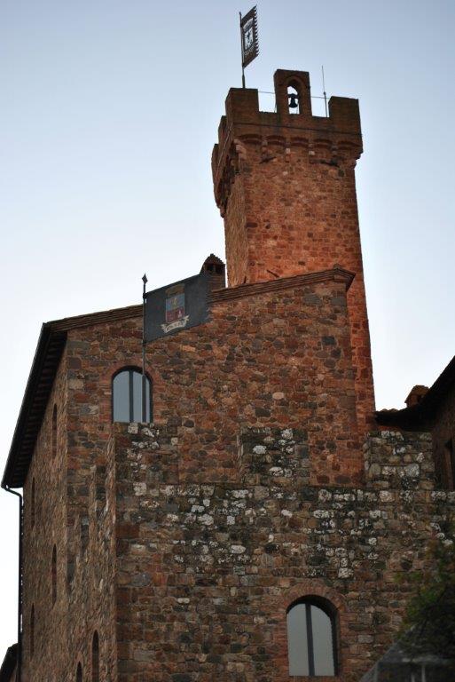 A brick building with a tower on top of it