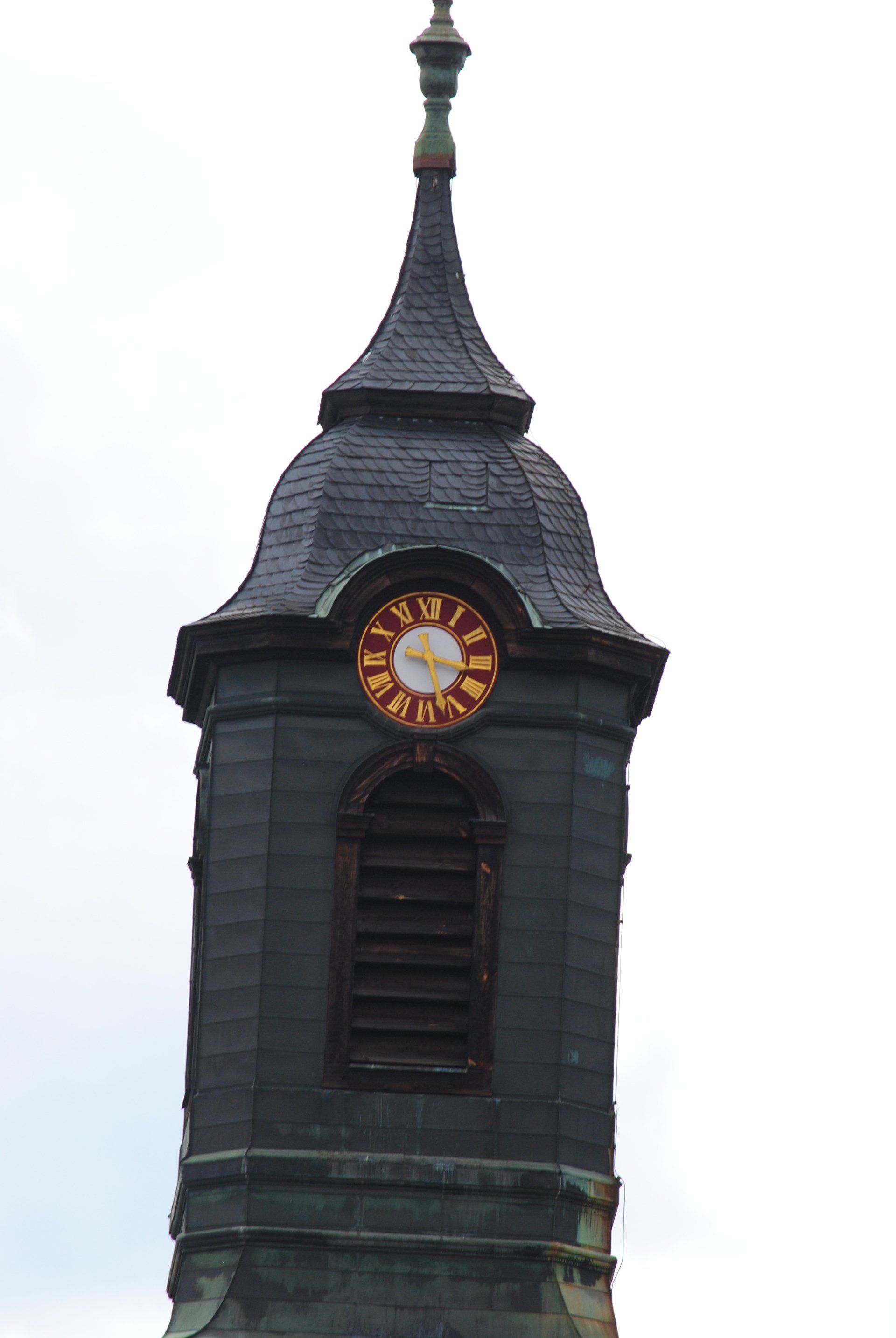 A clock tower with a clock on top of it