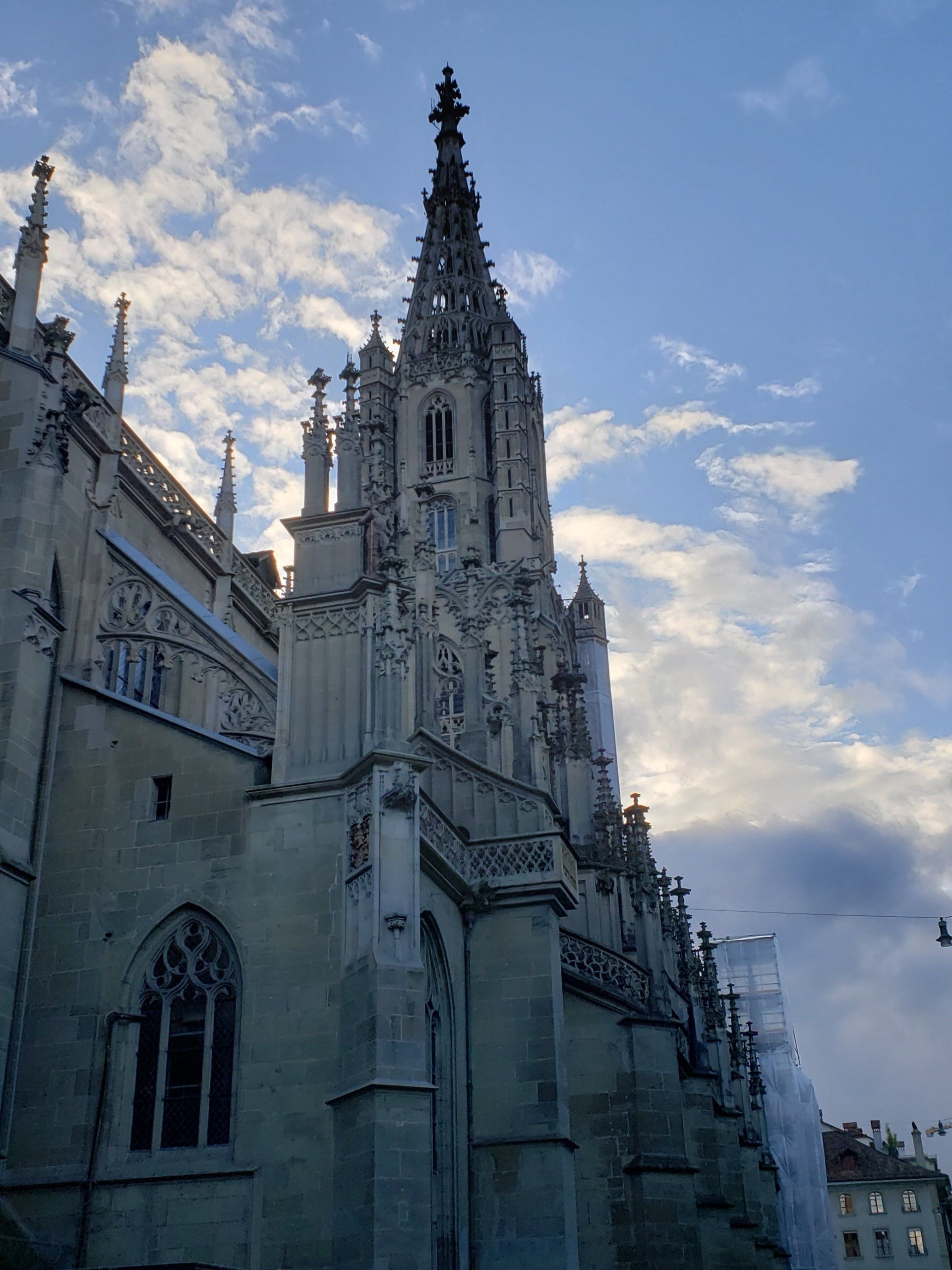 A large building with a very tall tower on top of it.