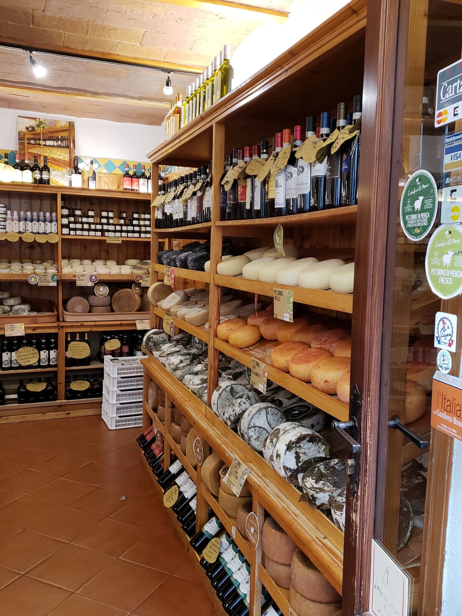 A store filled with lots of food and wine bottles