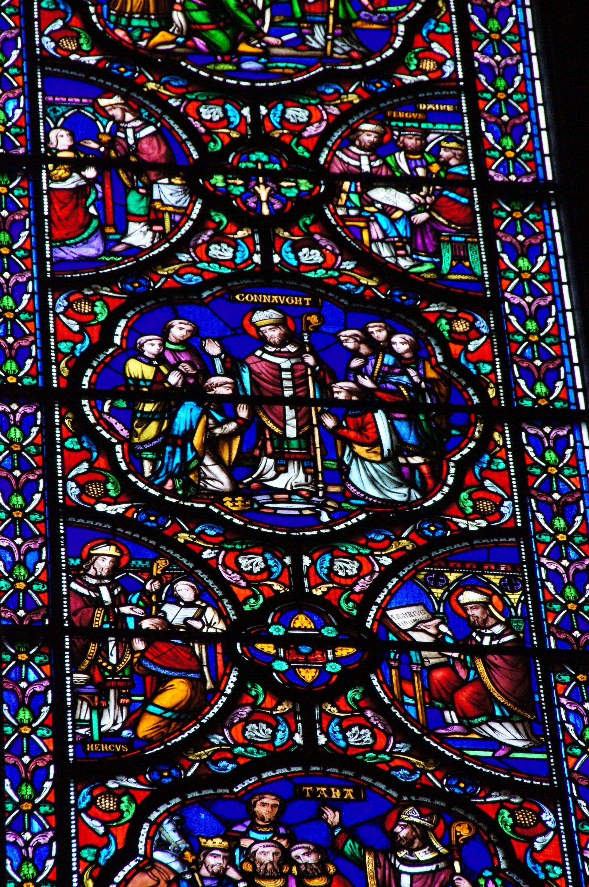 A close up of a stained glass window in a church