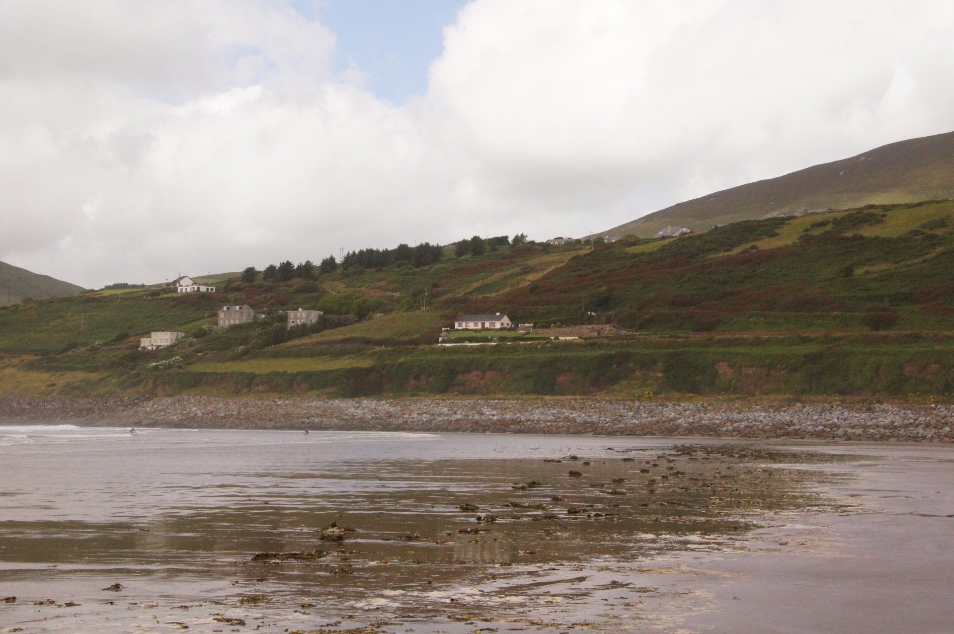 A large body of water with mountains in the background