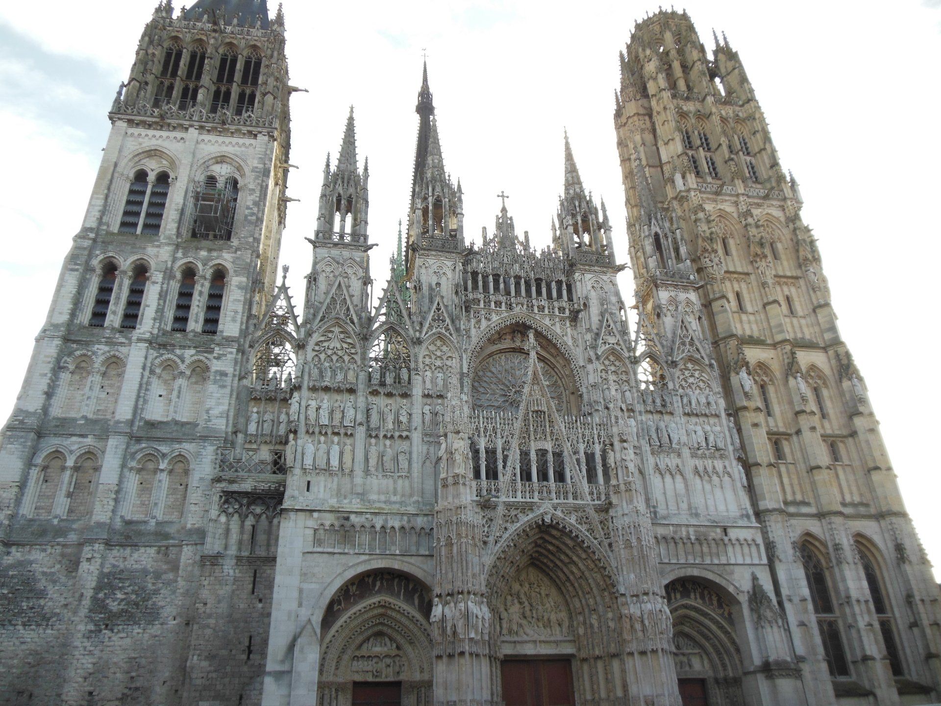 A large castle with two towers on top of it