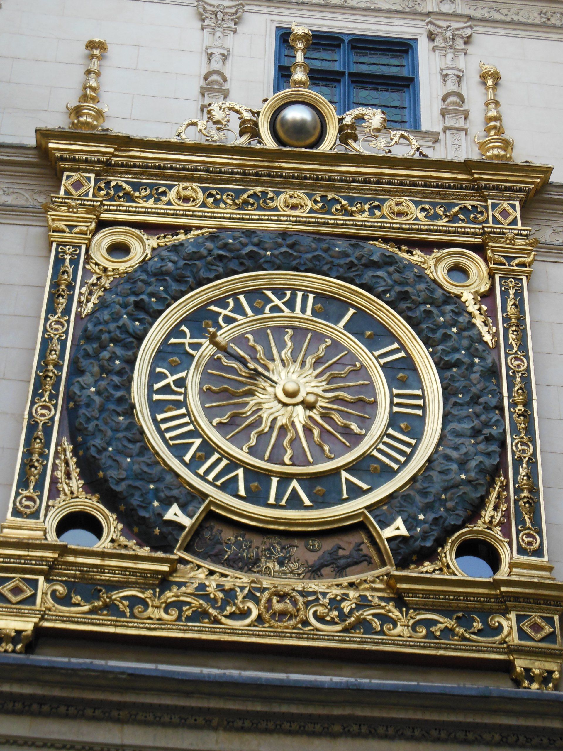 A large clock with roman numerals on it