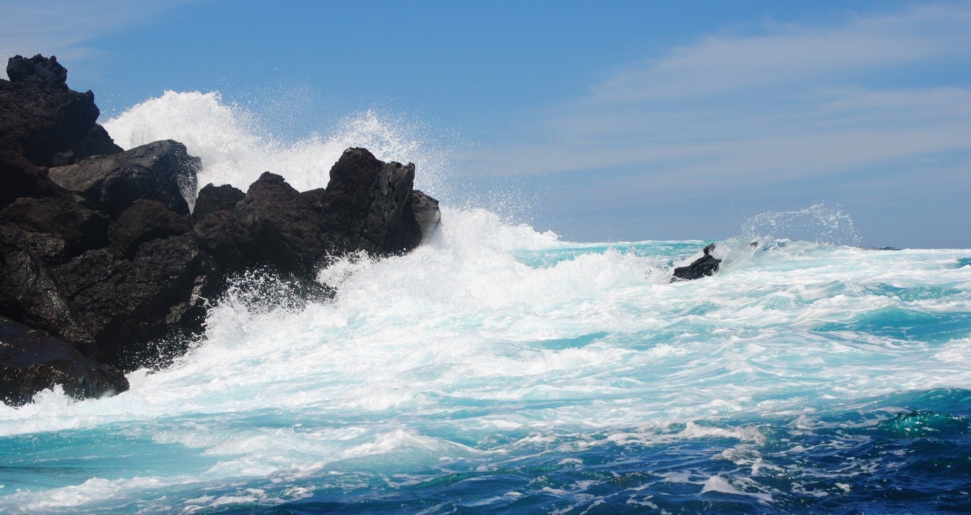 A person is riding a jet ski in the ocean.