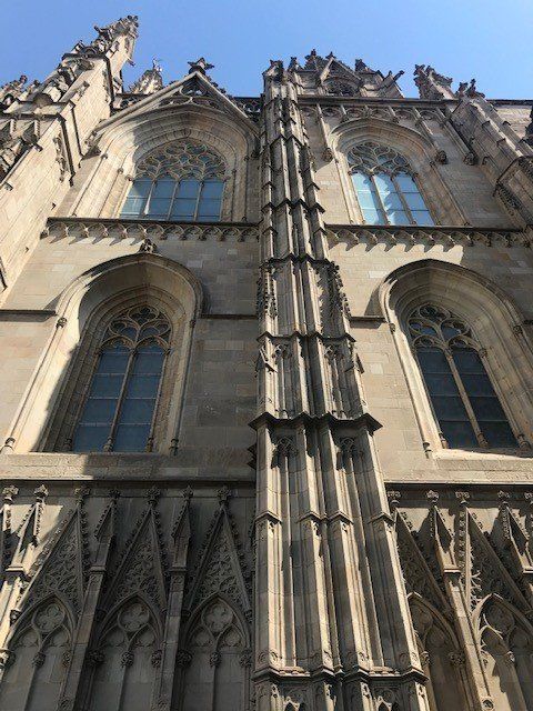 Looking up at a large building with a lot of windows.