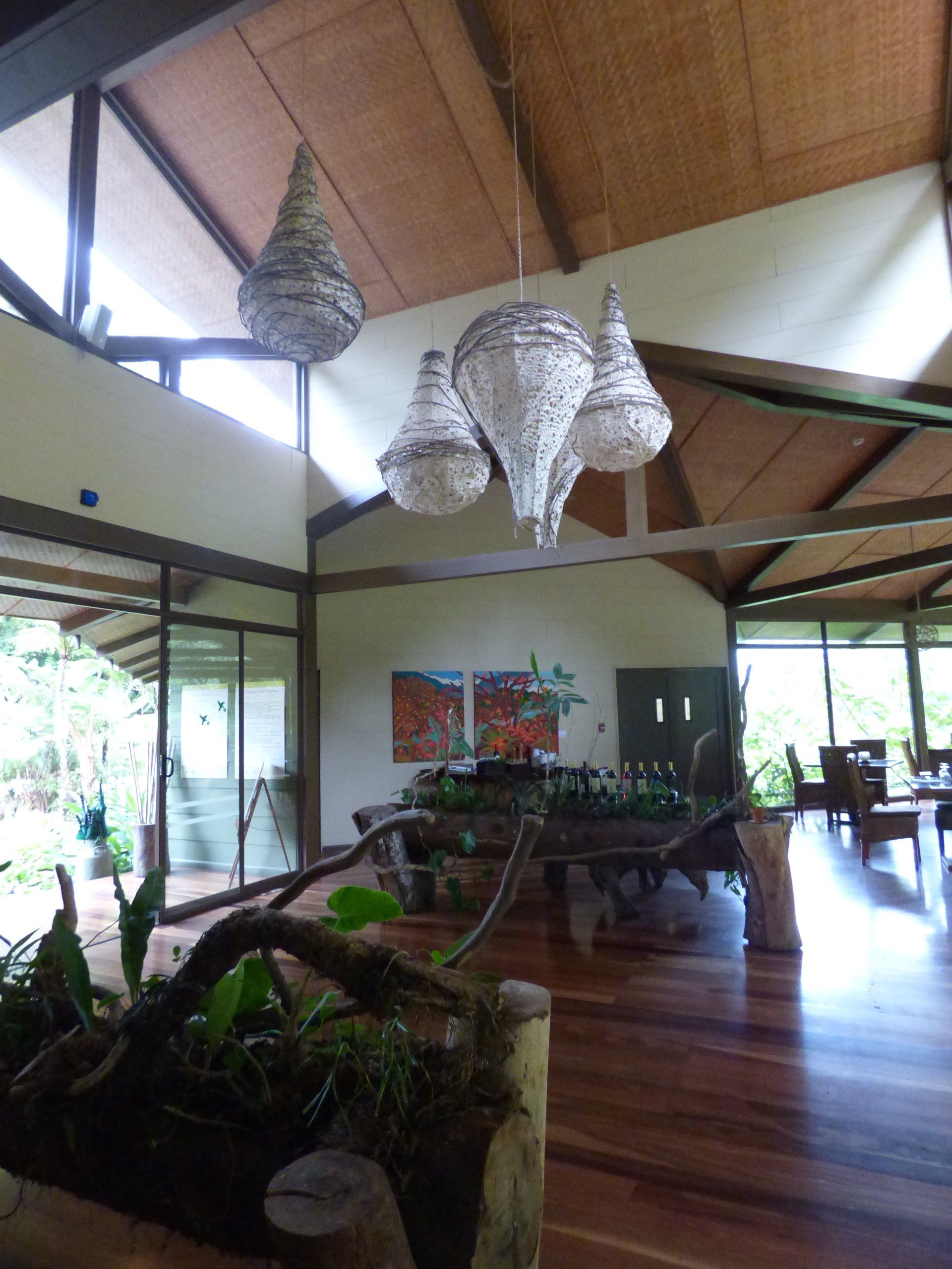A large room with a wooden table and chairs