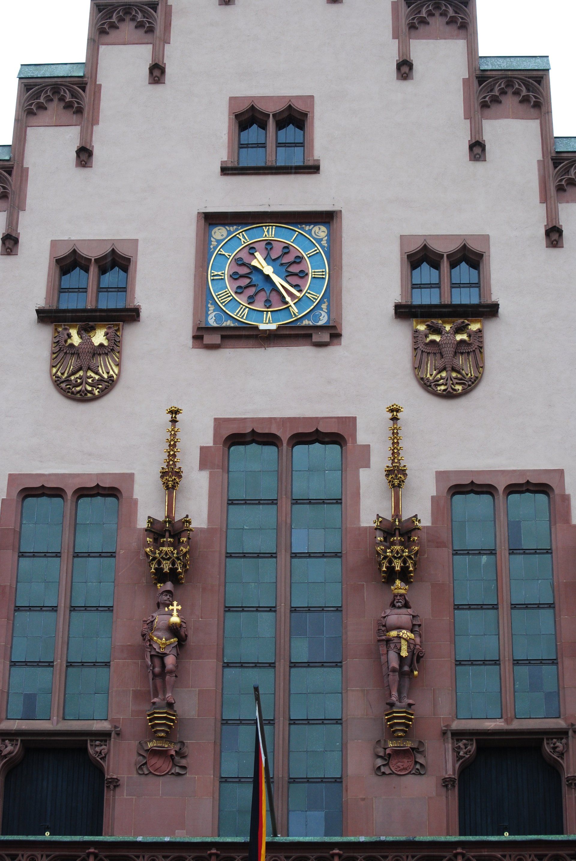 A large building with a clock on top of it