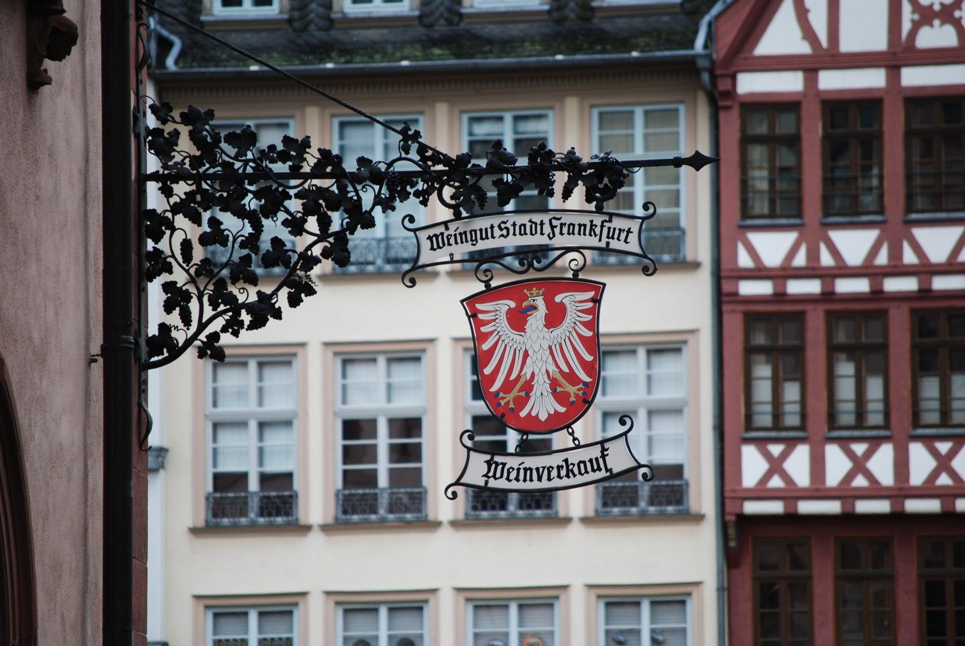 A building with a sign that says ' weinhof ' on it