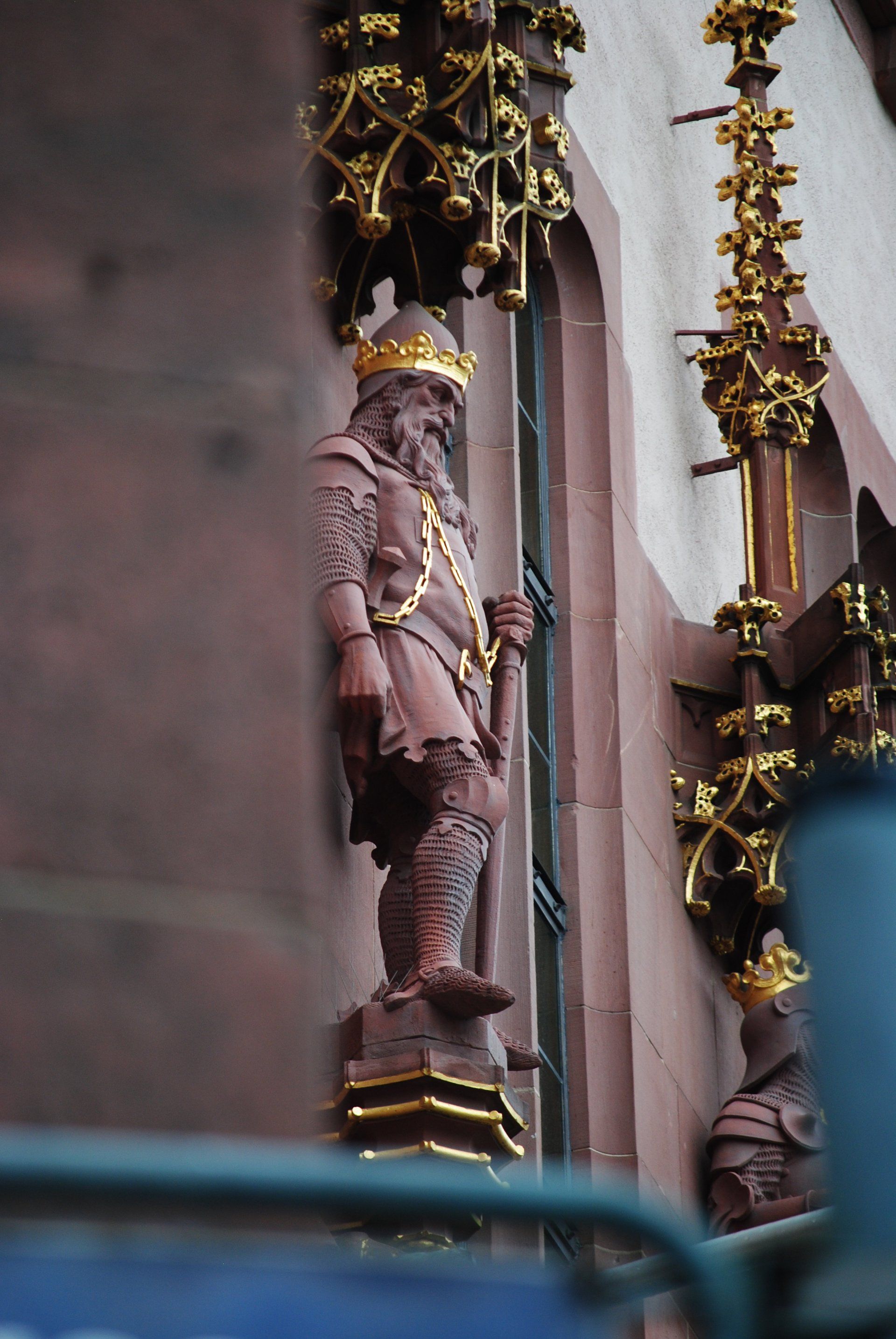 A statue of a man with a crown on his head