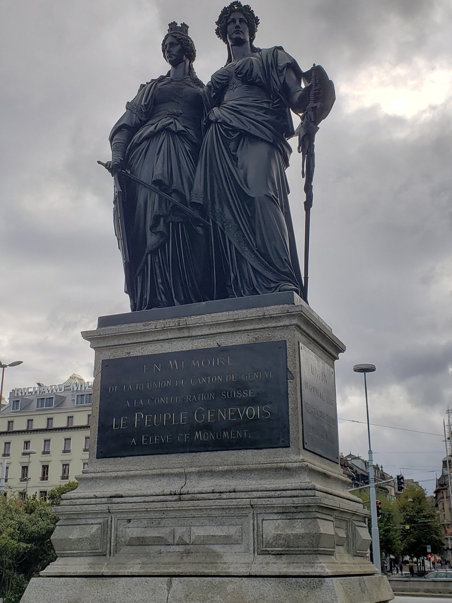 A statue of two women standing next to each other