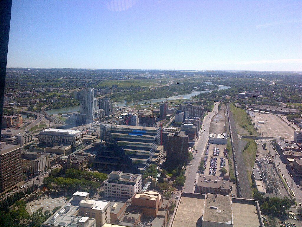 An aerial view of a city with a river running through it