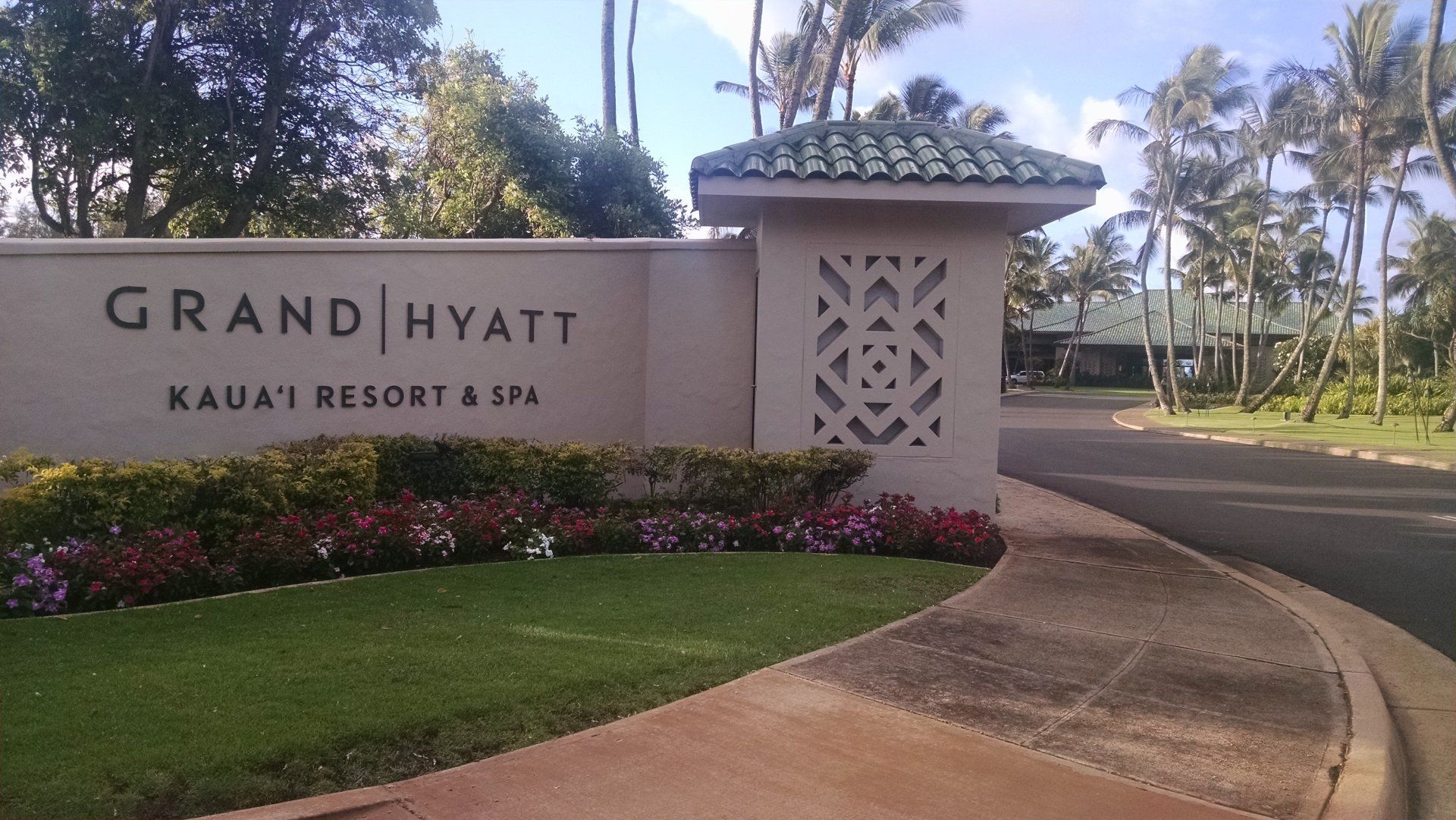 A sign for grand hyatt kauai resort and spa