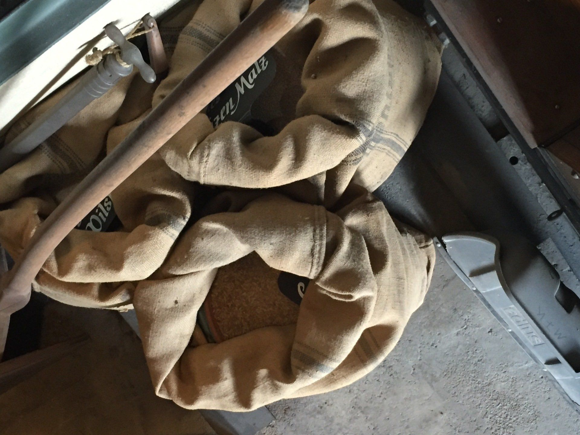 A brown bag that says ' baby ' on it